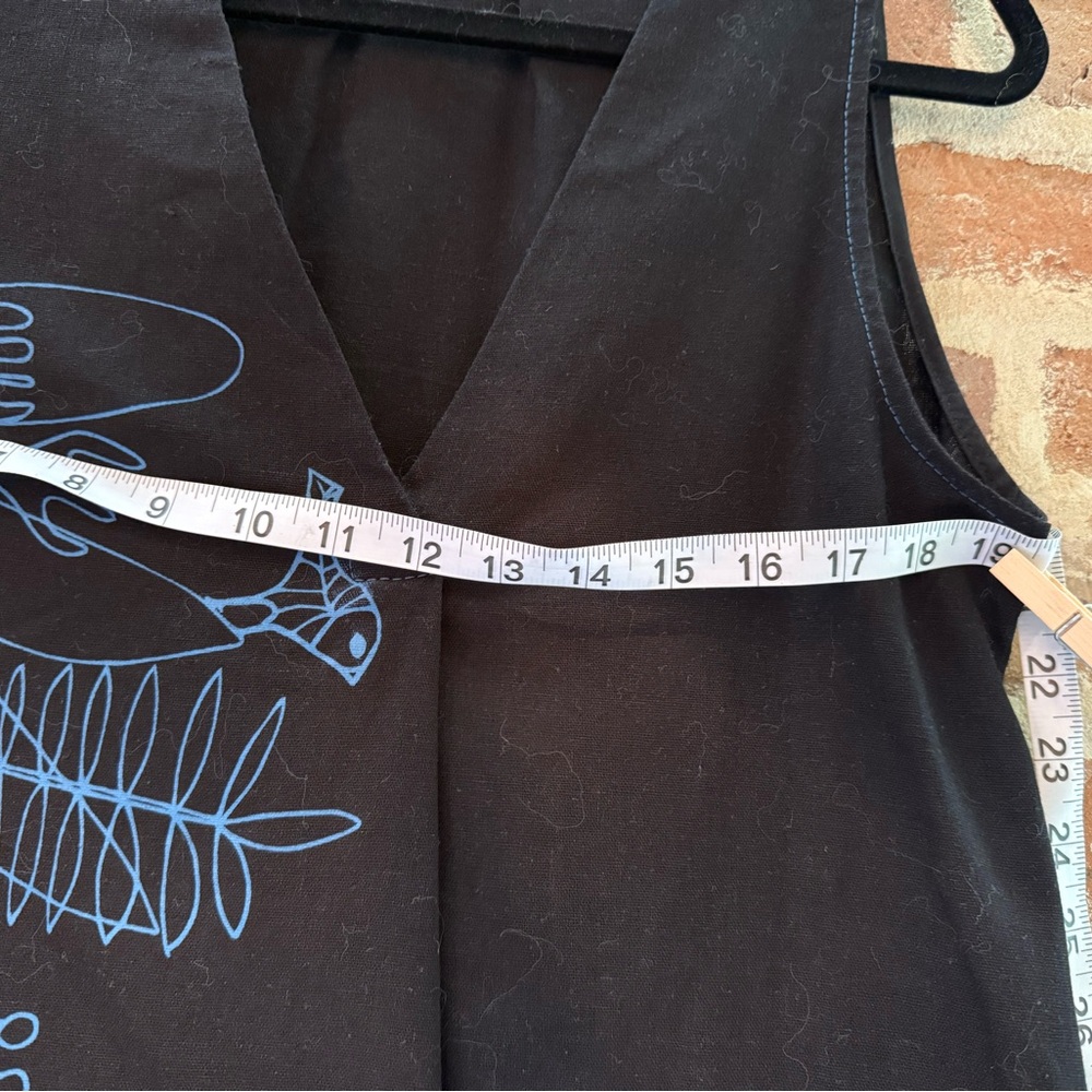 Black Sleeveless Top with Blue Graphic